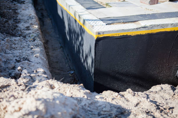Professional Waterproofing technician working in New Johnsonville, TN